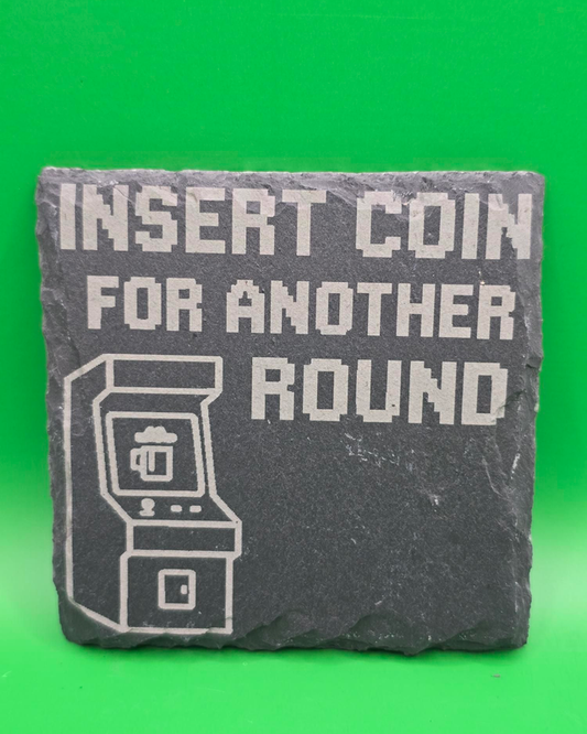 Insert coin for another roung slate coaster