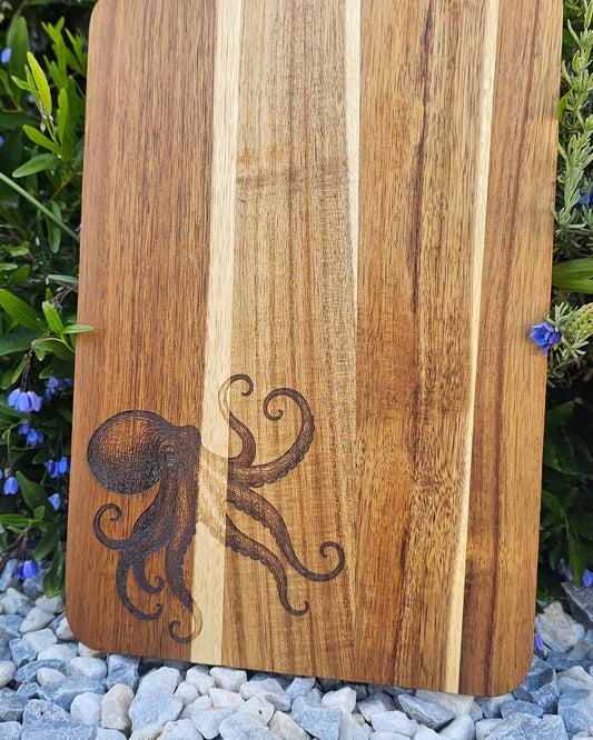 Wooden cutting board with an engraved design on a natural background