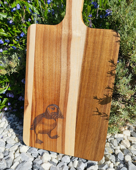 Personalised puffin acacia cutting board, laser engraved in Guernsey